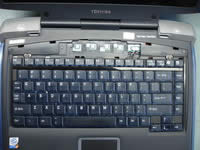 Toshiba Satellite 5205. Remove screws and lift up keyboard.