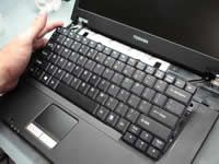 Toshiba Portege A100. Remove modem card and wireless card.
