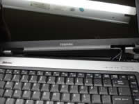 Toshiba Portege A100. Remove modem card and wireless card.