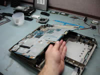 Lift up and remove motherboard